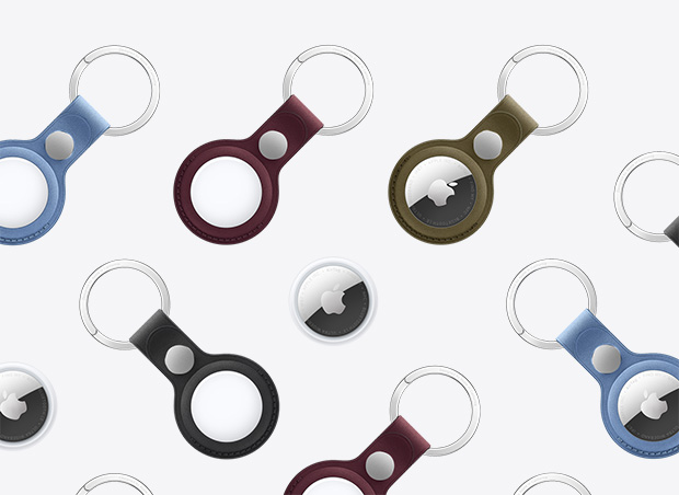 AirTag e chaveiro de tecido FineWoven para AirTag: várias cores, incluindo glacial, bordô e verde. Os acessórios para chaveiro exibem o logotipo da Apple na frente ou gravações personalizadas atrás