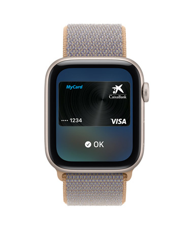 Apple Watch SE 3, aluminum case, starlight color, screen shows Wallet, payment card graphic, right side exterior, Digital Crown dial, Sport Loop band, chambray blue color (light blue-gray)