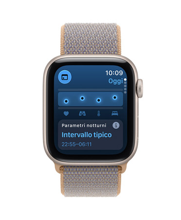 Apple Watch SE 3, screen shows overnight vitals, aluminum case, starlight color, right side exterior, Digital Crown dial, connected to Sport Loop band, chambray blue color (light blue-gray)