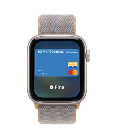 Apple Watch SE 3, aluminum case, starlight color, screen shows Wallet, payment card graphic, right side exterior, Digital Crown dial, Sport Loop band, chambray blue color (light blue-gray)