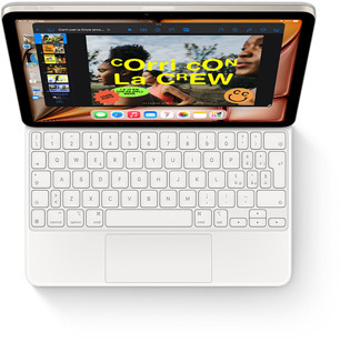 Un iPad Air mostrato dall’alto con una Magic Keyboard bianca.