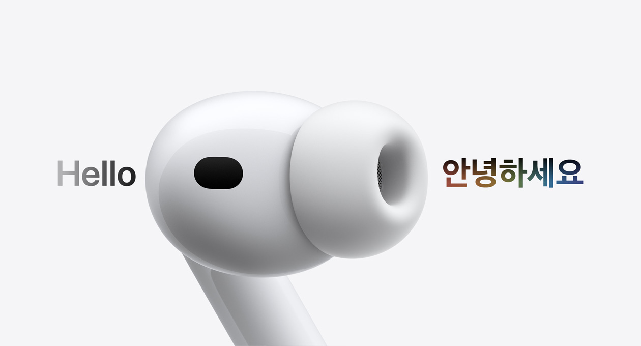 실리콘 팁을 장착한 이어버드가 보이는 AirPods Pro 3, 실시간 번역 기능이 중국어 문자를 한글로 '안녕하세요'로 변환하는 모습