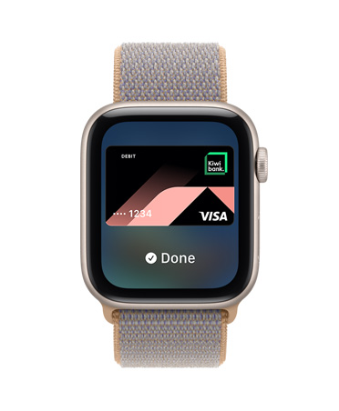 Apple Watch SE 3, aluminium case, starlight colour, screen shows Wallet, payment card graphic, right side exterior, Digital Crown dial, Sport Loop band, chambray blue colour (light blue-grey)