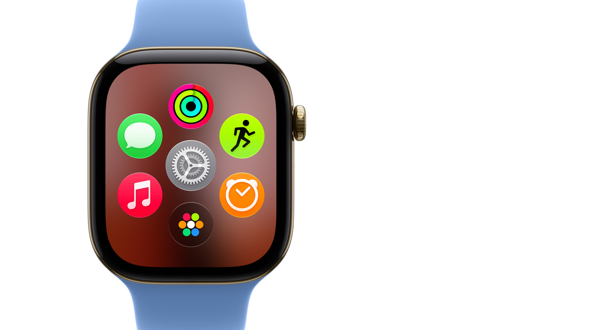 Apple&nbsp;Watch&nbsp;Series&nbsp;12 z&nbsp;kopertą z&nbsp;tytanu w&nbsp;kolorze żywego złota wyświetla siatkę aplikacji w&nbsp;apce Dynamic Island