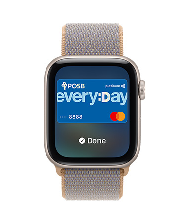Apple Watch SE 3, aluminium case, starlight colour, screen shows Wallet, payment card graphic, right side exterior, Digital Crown dial, Sport Loop strap, chambray blue colour (light blue-gray)