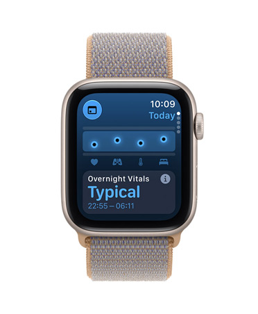 Apple Watch SE 3, screen shows overnight vitals, aluminum case, starlight color, right side exterior, Digital Crown dial, connected to Sport Loop band, chambray blue color (light blue-gray)