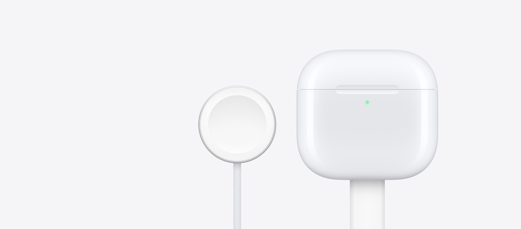 Kutijica za punjenje slušalica AirPods 4 uz punjač za Apple Watch.