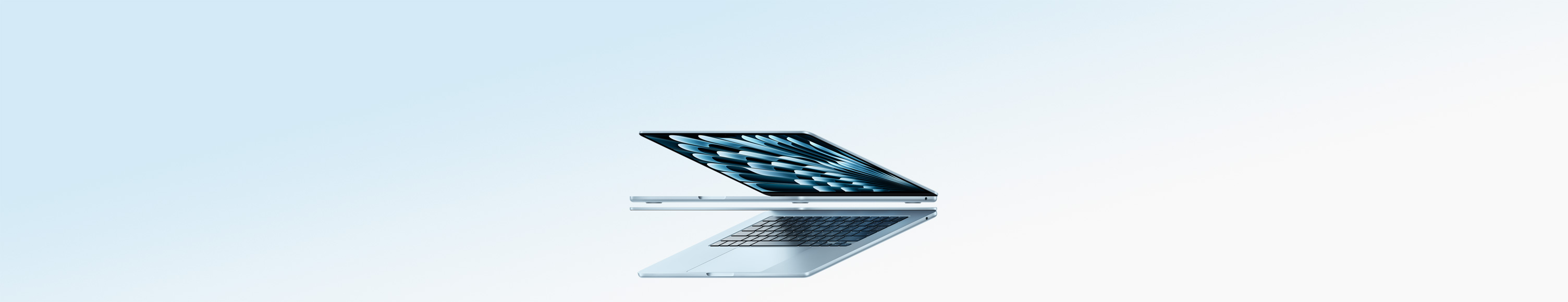 Два MacBook Air лаптопа в небесносиньо във форма на стрела, подчертаваща тесния профил