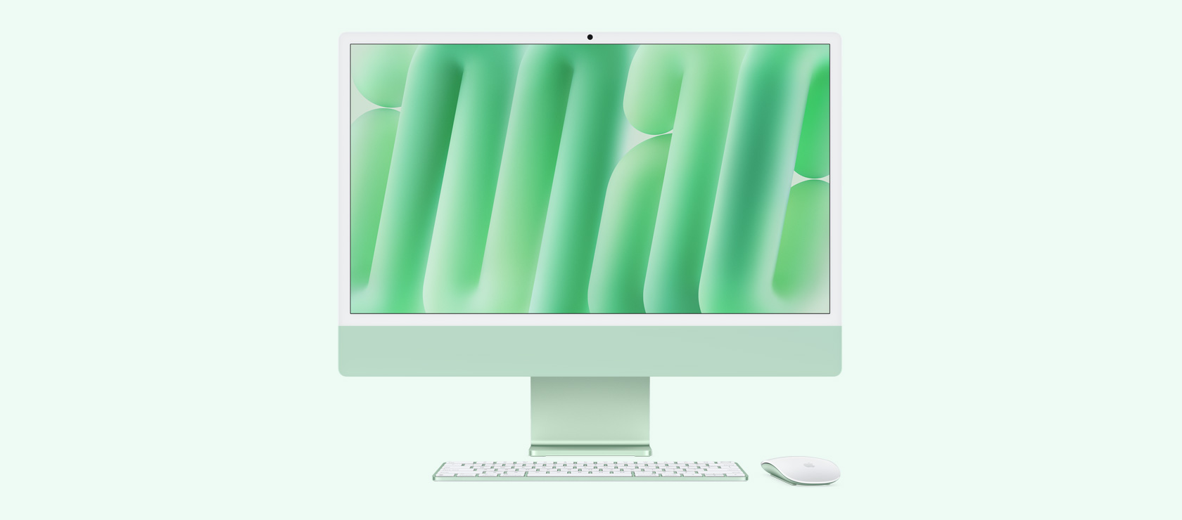 Roheline iMac eestvaates koos sama värvi hiire ja klaviatuuriga