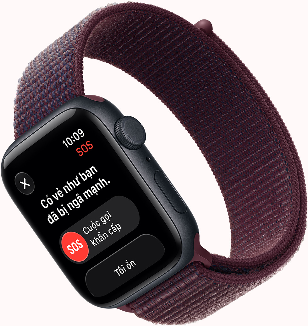 Apple Watch SE 3, vỏ nhôm, màu ánh sao, thông báo Phát Hiện Ngã SOS, các nút cuộc gọi khẩn cấp, mặt ngoài bên phải, Digital Crown, micrô, nút sườn, dây đeo, Dây Quấn Thể Thao, màu tím sương khói